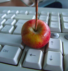 Image showing tiny apple on keyboard