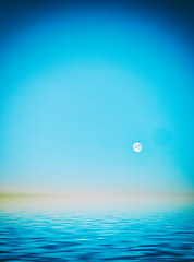 Image showing Blue landscape with a marine background and sunset and moon. Abstract night landscape in blue light. Moon coming out over the evening ocean water. Empty futuristic landscape