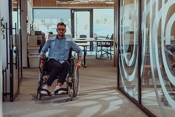 Image showing In a large modern corporation, a determined businessman in a wheelchair navigates through a hallway, embodying empowerment and inclusivity in the corporate world.