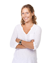 Image showing Portrait, smile and fashion with a woman arms crossed in studio isolated on a white background for style. Happy, trendy and confident young person in a clothes outfit to relax in comfort for leisure