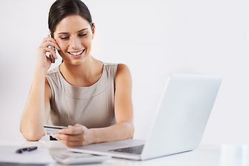 Image showing Business woman, credit card and phone call for banking, ecommerce and payment for online shopping, Laptop, smile or happy worker talking on smartphone for fintech info, service or investment advice