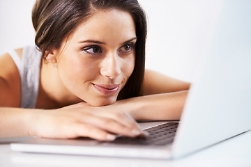Image showing Laptop, relax or woman in office typing, writing email or web surfing for research analysis on internet. Business, computer and happy female worker working on pc planning at work in company or agency