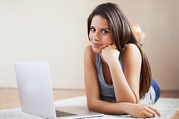 Image showing Floor, laptop or portrait of student in e learning, online education or typing for university at home. Remote work, relax or woman on computer to research information or report on a college website