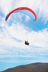 Image showing People, paragliding and freedom in sky, mountain or extreme sport with smile for fitness. Coach, partnership and person on adventure, clouds or fearless with backpack, parachute or flight in summer