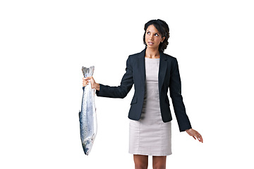 Image showing Woman, business and bad work deal or stink task offer for corrupt crime, company fraud or job scam. Upset person, dead fish and disgust smell for proposal in studio, mockup space on white background
