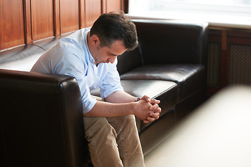 Image showing Businessman, sad and sofa in office for unemployment, job loss mistake or failure anxiety. Male person, stress thinking and head low on couch for disappointed problem at work, frustrated or grief