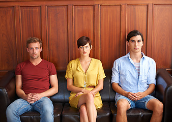 Image showing Portrait, recruitment and bored people waiting on a sofa in an office for a human resources interview. Business, hiring and job opportunity with an impatient candidate group in a workplace lobby