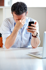 Image showing Business man, laptop and phone with stress, headache and thinking for finance review, mistake or tired. Accountant, pc and smartphone with burnout, fatigue or mental health with fail, glitch or error