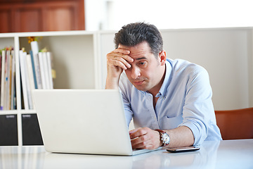 Image showing Businessman, laptop and stress or anxiety at office, email and online research on technology. Mature man, frustrated and crisis on digital, problem and issues or glitch, 404 error and connection fail