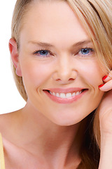 Image showing Portrait, smile and beauty with a woman closeup in studio isolated on white background for natural wellness. Face, skincare and a happy young model looking confident with her cosmetic skin aesthetic