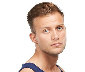 Image showing Portrait, beauty and blue eyes with a man in studio isolated on a white background for aesthetic wellness. Face, skincare and natural with a confident young model looking confident or masculine