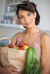 Image showing Happy woman, portrait and grocery bag with vegetables or fresh produce in kitchen at home. Female person, shopper or vegan smile with food or groceries for salad, cooking or healthy diet at house