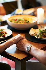 Image showing Holding hands, home or couple praying for food or support at a dinner table together to celebrate. Christian religion, God or closeup of spiritual people eating lunch with faith, hope or gratitude