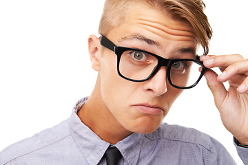 Image showing Spectacles, optometry and portrait of man in a studio with confused, doubt or squinting facial expression. Vision, health and young male person with glasses or eyewear isolated by white background.