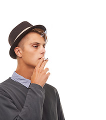 Image showing Young man, hat and smoking cigarette in stylish fashion isolated against a white studio background. Cool male person, model or smoker chilling in vintage clothing or having a casual smoke on mockup
