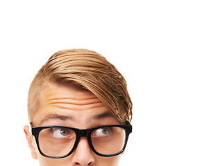 Image showing Glasses, thinking and young man in a studio with choice, looking or decision facial expression. Optometry, idea and half face of male person with spectacles or eyewear isolated by white background.