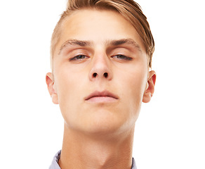 Image showing Portrait, serious and a man with headshot on a white background for suspicious, mean or confident. Face, young and a guy or person on a studio backdrop for cool, attitude or looking arrogant or rude