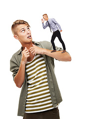 Image showing Listening, ego and a man on a white background with a person for horror, scared and alarmed. Young, expression and a guy with danger, terrified or afraid of a male on shoulder on a studio backdrop