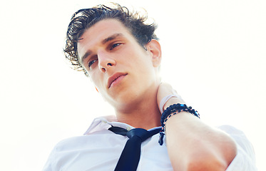 Image showing Serious face of man, fashion and confident on white background with hand on neck. Thinking, wellness and young male model with cool rebel aesthetic, punk culture and calm expression and grunge style.