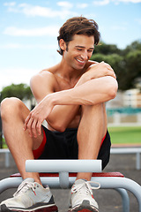 Image showing Man, smile and touching arm muscle, happy and proud of results from exercise, workout and training. Excited male athlete, achievement and successful with body building, ripped and confident in health