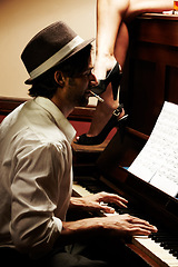 Image showing Profile, artist and man with piano, smoking and music with sound, smoker and entertainment with performance. Person, player or musician with jazz, performer and listening with cigarette or instrument