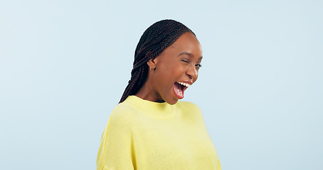Image showing Wink, flirty and portrait of a black woman on a studio background for love, conversation or a smile. Happy, mockup space and an African person with facial expression for a secret or confident
