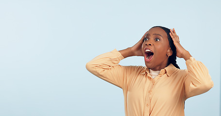 Image showing Wow, space and surprise with a black woman in studio on a gray background to hear good news. Emoji, mock up and expression with a mind blown young person looking shocked by a promotion or bonus