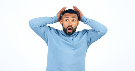 Image showing Shock, emoji and portrait of man in a studio with wow, omg or wtf facial expression for news. Amazing, surprise and face of young ale person from Colombia with crazy face isolated by white background