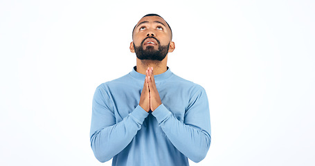 Image showing Worship, prayer and man praying in studio for thank you, faith or help on white background. Jesus Christ, hope and male model in prayer, trust or praise, gratitude or guidance, holy or gospel peace