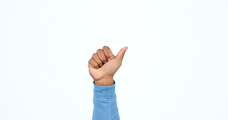 Image showing Thumbs up, hand and person with sign for yes in studio, white background with feedback of support. Thank you, vote and icon for success, agreement and emoji for achievement of goals or ok review