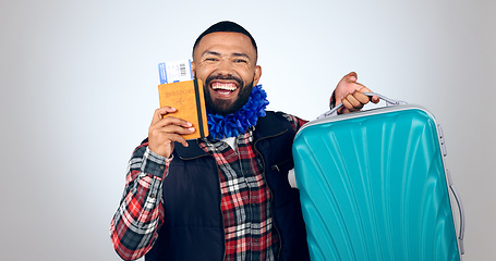 Image showing Happy man, suitcase and plane ticket for travel, excited about trip in portrait isolated on white background. Luggage, holiday and booking paperwork with passport and ready for adventure in studio