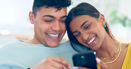 Image showing Couple, phone and relax on couch, laugh or reading for funny story, notification or post on web blog. Man, woman and smartphone for meme, streaming comic video or happy on social media app in home