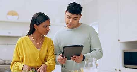 Image showing Cooking, tablet and couple in kitchen online for lunch, supper and research dinner recipe. Marriage, dating and man and woman on digital tech for internet, website and food blog at home for meal prep