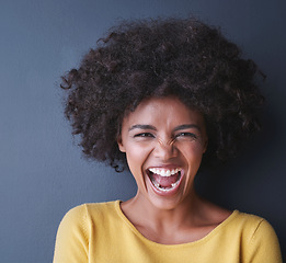 Image showing Laughing, black woman and portrait in studio with happiness, comedy or freedom in mockup space. Happy, face and African lady smile, emoji or crazy reaction to joke or humor on grey background