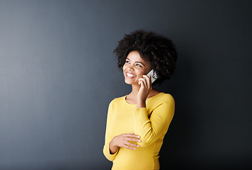 Image showing Black woman, thinking and happy phone call for planning, ideas or communication in studio background. African, face and person in mobile conversation with questions or listening to contact talking