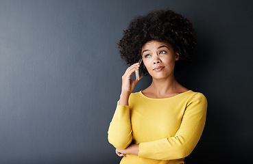 Image showing Black woman, thinking and phone call with questions, ideas, doubt emoji in studio background. African, face or person confused in conversation with drama, gossip or listening to contact communication