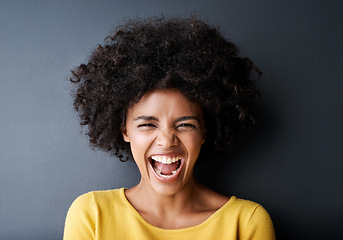 Image showing Laughing, black woman and funny portrait in studio with happiness, freedom or wellness in mockup space. Happy, face and African person with smile, emoji and crazy reaction on grey background