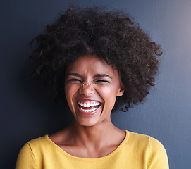 Image showing Laughing, woman and beauty portrait in studio with happiness, freedom or wellness mockup space, Funny, face and natural African hair care, cosmetics and smile for dermatology on grey background