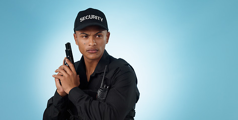 Image showing Man, security guard and holding gun for shooting, protection and precaution for job, serious or confident. Target, killing or weapon for criminal, safety or studio background for pistol, crime or law