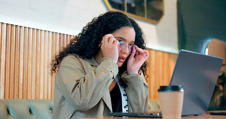 Image showing Laptop, reading glasses and coffee shop woman check internet, web or online research for freelance project, data or report. Customer analysis of hospitality review, restaurant info or diner article