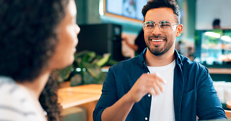 Image showing Happy man, glasses and smile on date in coffee shop for food, lunch or snack. Mexican person, laugh and funny joke with girlfriend in restaurant, bistro or cafe for bond, together and relationship