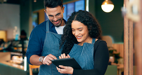 Image showing Cafe, business owner and teamwork on tablet for barista training, review sales and online management in hospitality. Happy woman, manager or waiter typing on digital technology for menu or planning