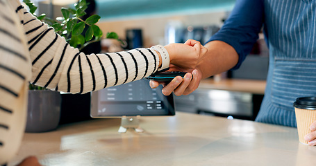 Image showing Smart watch, payment or hands of barista in cafe with cashier for shopping, sale or checkout. Fintech machine, customer or closeup of person paying for service, coffee cup or tea bills in restaurant