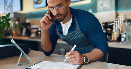 Image showing Barista, phone call and paperwork for restaurant, cafe logistics or coffee shop management. Supply chain checklist, manager writing or man in mobile communication for stock inventory in startup