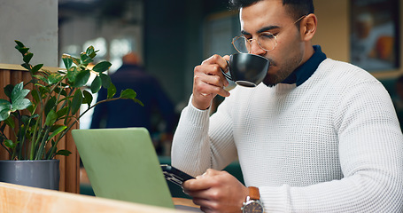 Image showing Man, coffee shop drink and phone for social media, laptop planning and remote work at small business. Freelancer or customer typing on his mobile for chat with espresso review at cafe or restaurant