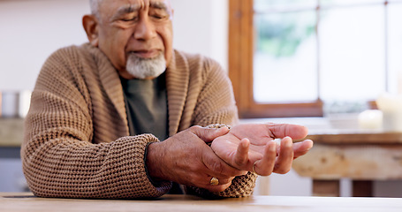 Image showing Senior man, wrist or pain with hand, inflammation and tendinitis for arthritis, frustrated and unhappy. Health issue, retired and sick for sprain, upset and ache for osteoporosis, injury and hurt