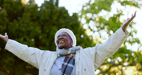 Image showing Nature, freedom and happy senior woman in a park for happy, celebration or travel adventure. Retirement, energy and African female person in a forest with gratitude for life, peace and fresh air