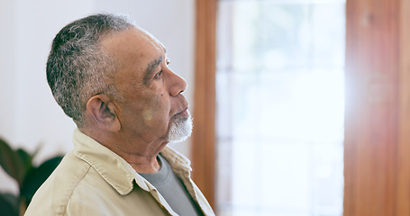 Image showing Home, thinking and old man with depression, mental health and lens flare with retirement. Pensioner, apartment and elderly guy feeling alone, memory or sad with stress, anxiety and lonely in a lounge