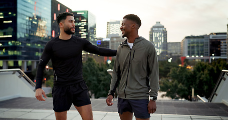 Image showing City, friends and men with fitness, support and happiness with sunset, progress and motivation. People, guys and runners outdoor, challenge or exercise with wellness, conversation or healthy activity