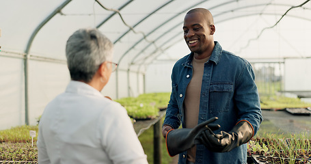 Image showing Team of people, happy farmer in greenhouse and agriculture, agro or test plants, research vegetables and ecology. Smile, black man and woman in nursery, botanist or scientist in garden for inspection